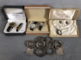 Lot of Costume Jewelry. (4) Watches, (1) Necklace and Earring Cameo Set, (1) Set of Napkin Ring