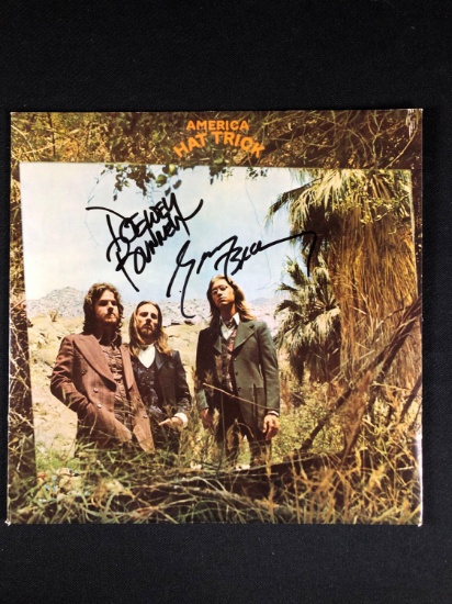 America "Hat Trick" Autographed Album Signed by Gerry Beckley and Dewey Bunnell