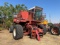 International Harvester 1470 Axial Flow Hillside Combine, w/Header on trailer