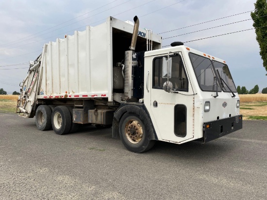 2004 Crane Carrier Co. Low Entry Refuse Truck With Leech Compactor