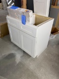Assortment of Cabinets and Vanity Mirror