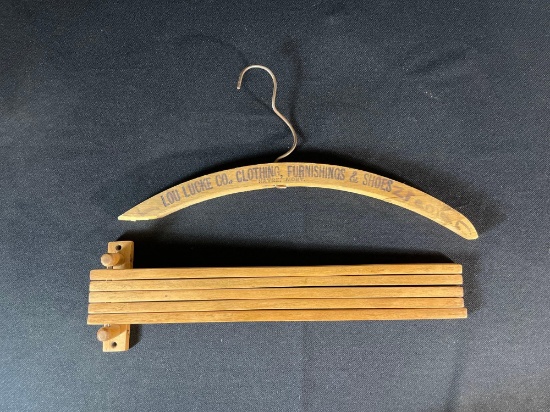 Lou Lucke Co. Clothing, Furnishings, & Shoes Havre Mt. Wooden Clothes Hanger & Wall Mounted Drying