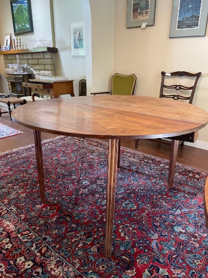 Antique Oak table, round, with one drop leaf. 46" round, 22" drop leaf