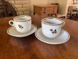 Pair Of Royal Ironstone Tea Leaf cups & saucers