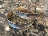 Pair of sterling bracelets marked Sitka, AK, unknown artist