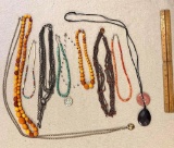 Costume jewelry, necklaces. From retailers such as Nordstrom and Macy's, as well as artisan makers.