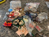 Assortment bag of costume jewelry, misc, damaged & single pieces, see photo.