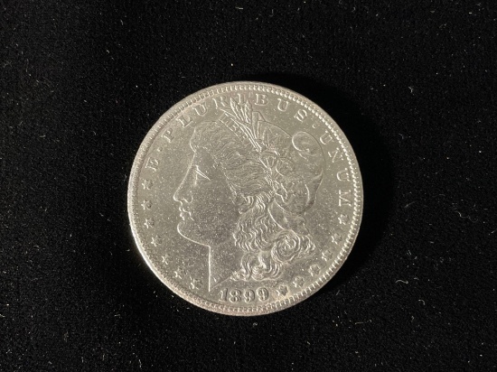1899 o Morgan silver dollar w/ plastic protector case