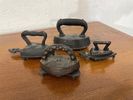 (4) Vintage miniature sad irons w/ stands -see photo's-