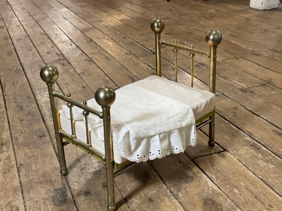 Vintage brass doll bed w/ foam padding