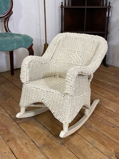 Vintage children's white wicker armed rocking chair