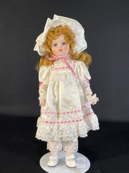 16" Porcelain doll in a white & pink dress w/ stand