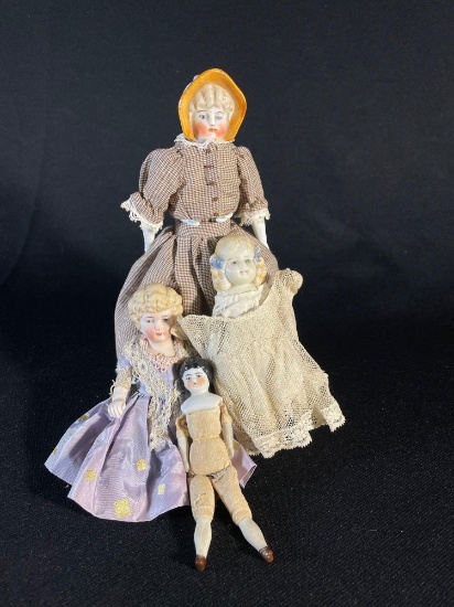 (4) Small vintage bisque hand painted dolls