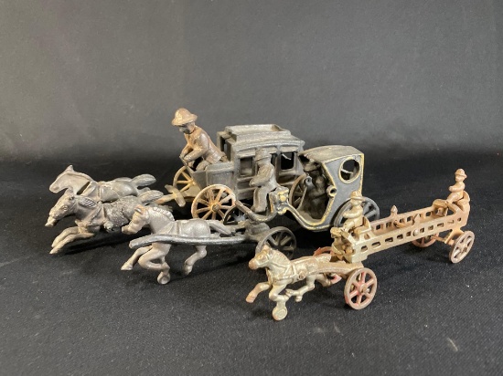 (3) Cast iron horse drawn carriages w/ drivers -see photo's-