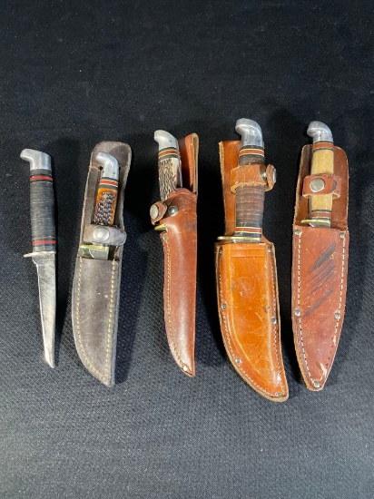 (4) Western fixed hunting knives w/ sheath's