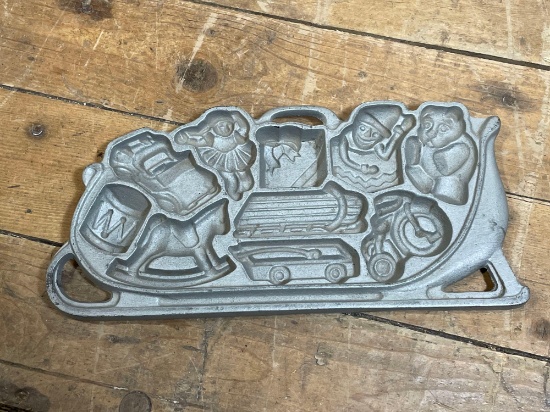 John Wright Co. cast iron "Sleigh-O-Toys" cookie pan