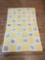late-19th century, made from repurposed feed sacks. The quilt features a patchwork design