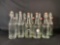 (22) Clear, Green & Brown glass bottles with swing-top closures