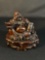 Laughing Buddha, also known as Hotei or Budai, and is associated with good fortune, happiness, etc.