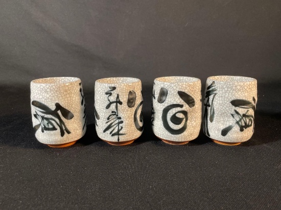 four Japanese tea cups, known as "yunomi"