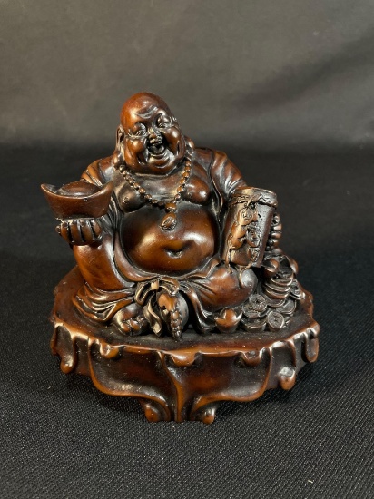 Laughing Buddha, also known as Hotei or Budai, and is associated with good fortune, happiness, etc.