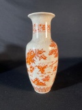 Chinese porcelain vase with an iron red design, featuring children playing and a crackle glaze