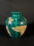 porcelain vase with a faux bronze and malachite finish, featuring a calla lily
