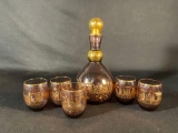 Murano glass decanter set, which includes a decanter and six matching glasses