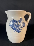 Pfaltzgraff Yorktowne 64 oz pitcher, characterized by its blue floral design on a creamy gray ston
