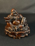 Laughing Buddha, also known as Hotei or Budai, and is associated with good fortune, happiness, etc.