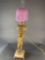 Standing Cherub Cranberry table lamp
