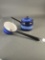 Blue banded sauce pan and water dipper