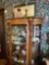 Oak curved glass china with lions heads and claw feet 1900