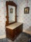 Walnut dresser with drop pulls marble top