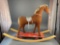 Mohair child's rocking horse also on wheels