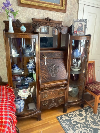 Great oak double china bookcase with carved lions heads 1890s