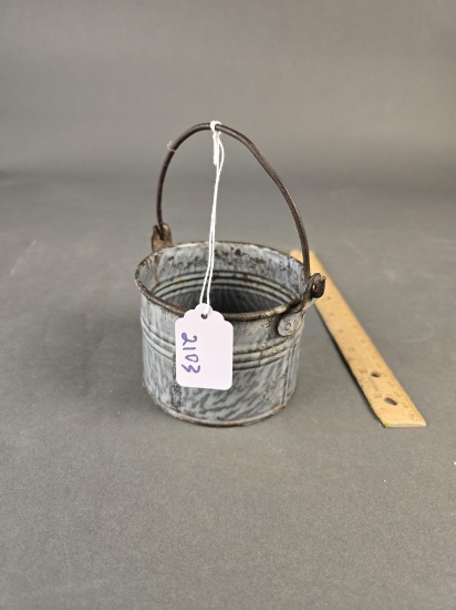 Small grey granite bucket