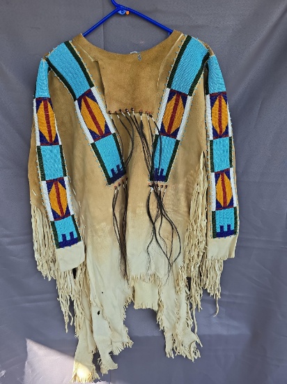 Beaded buckskin shirt, great strips on hide shirt