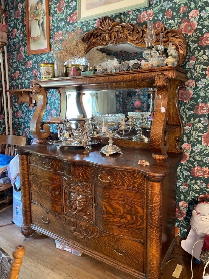 Massive solid Oak buffet with Northwind Carved Face. 1890s
