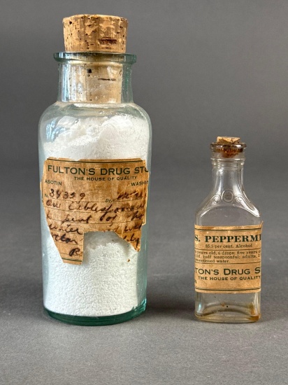 2 early medicine bottles from Fulton Drug Store, Asotin Wa.