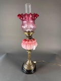 Cased pink font, cranberry shade lamp