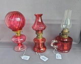 3 minature cranberry lamps
