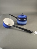 Blue banded sauce pan and water dipper