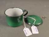 Green banded cup and advertising saucer