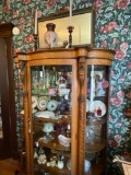 Oak curved glass china with lions heads and claw feet 1900