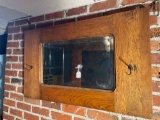 Oak mirror with hat hooks