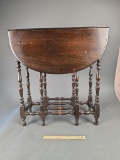 Walnut gate leg drop leaf table