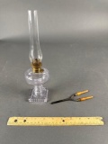 Child's kerosene lamp turning purple (pre 1917) w/ child's curling iron