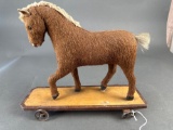 Mohair horse on platform with wheels