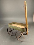 Child's green daisy wagon 1900's